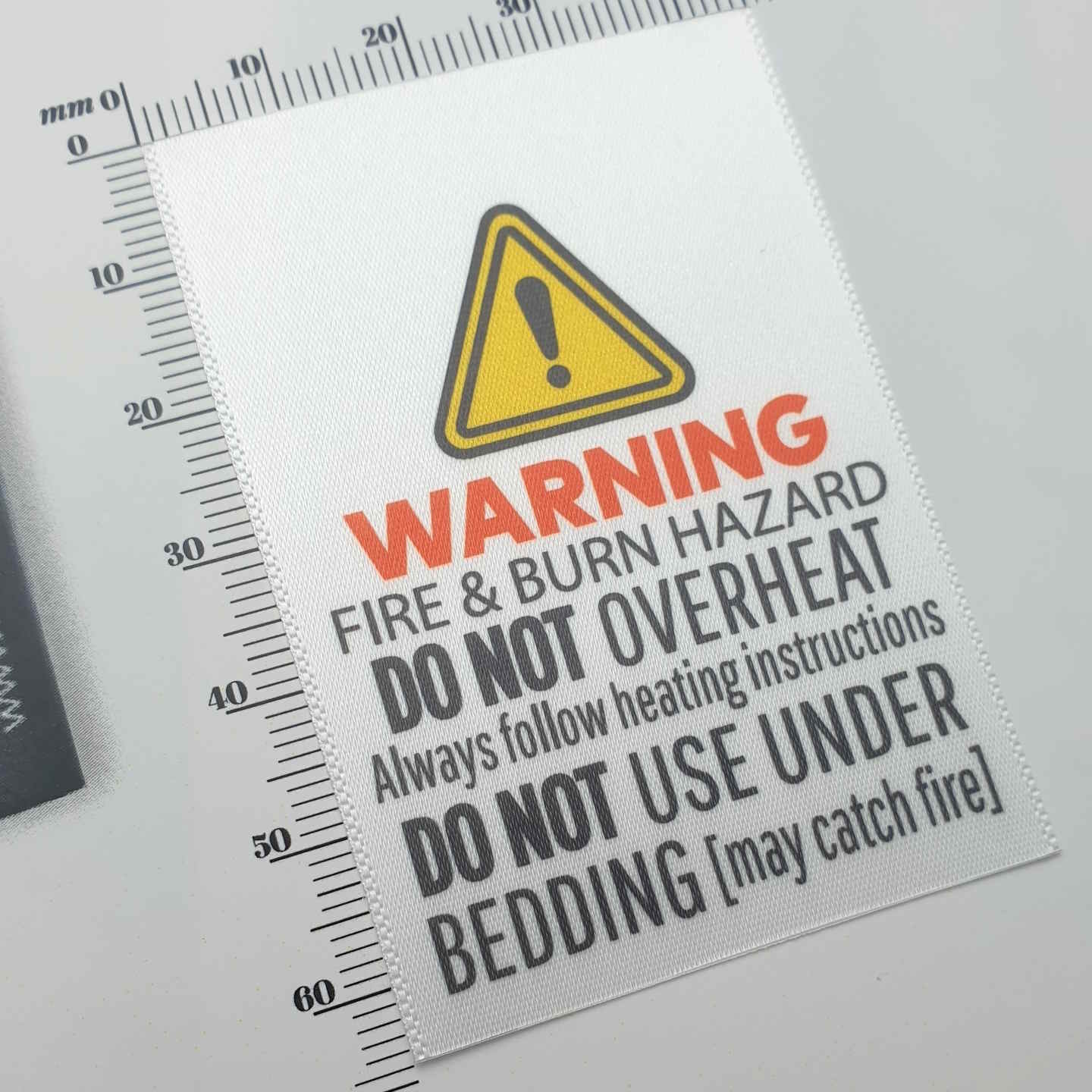 MICROWAVABLE HEAT PACK SAFTEY WARNING LABELS - PRINTED SATIN OR TAFFETA LABELS